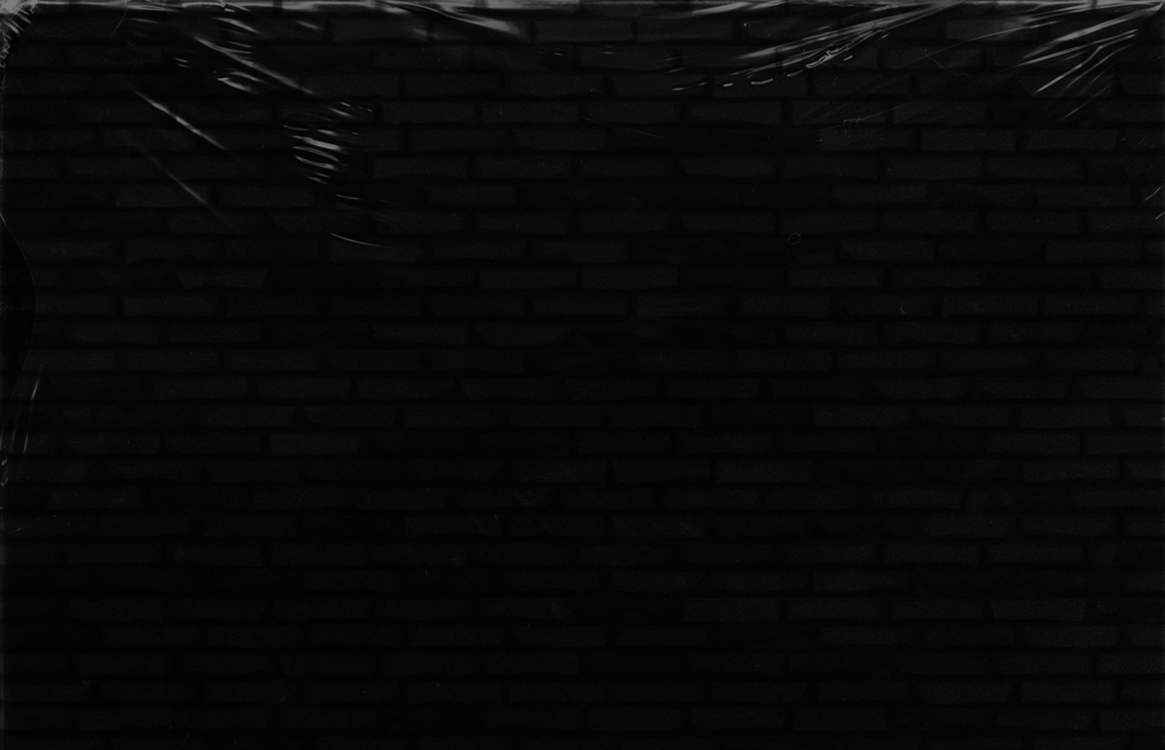 555 Black Brick Wall